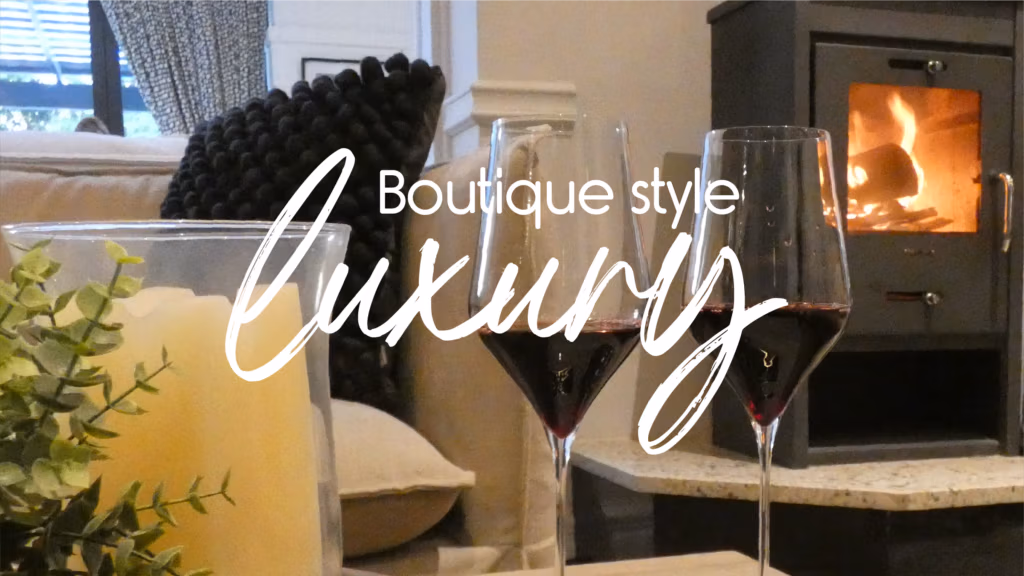 Boutique luxury guesthouse lounge with fireplace and wine at 58 on Hume Johannesburg
